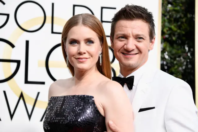 Amy Adams and Jeremy Renner