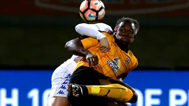 Cambridge's Uche Ikpeazu holds up the ball