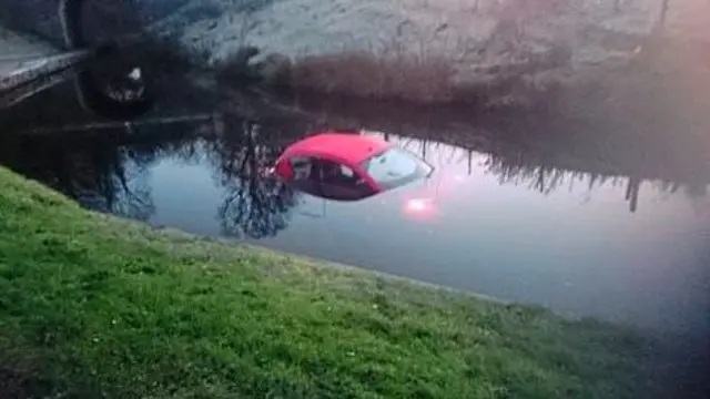 Car in canal