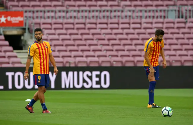 Luis Suarez and Gerard Pique