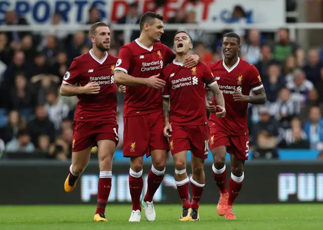 Liverpool celebrate scoring the lead