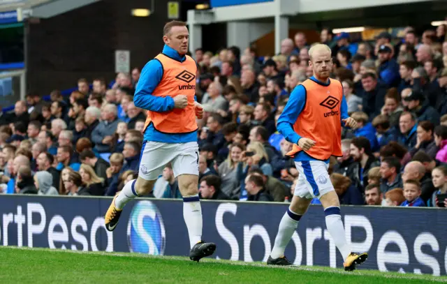 Rooney warms up