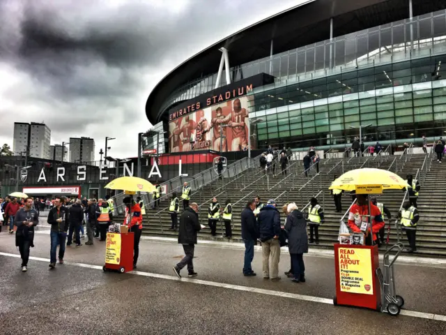 Fans arrive outside the Emirates Stadium