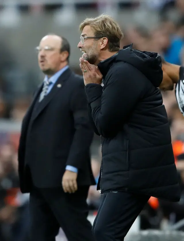 Benitez and Klopp on the sidelines