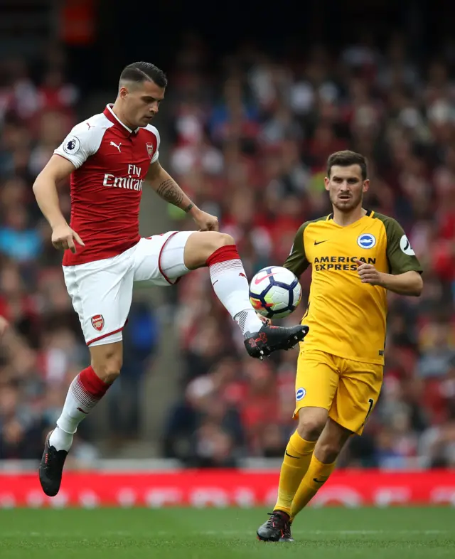 Xhaka takes control of the ball