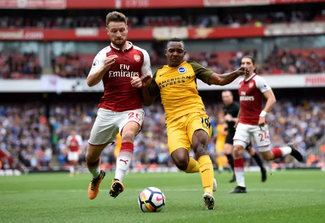 Arsenal's Mustafi in action with Brighton's Izquierido