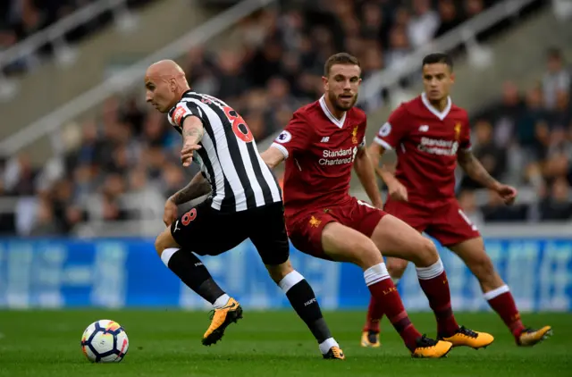 Jonjo Shelvey goes past Henderson