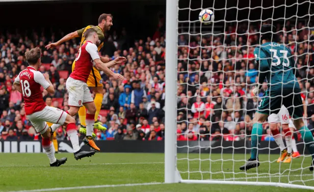 Glen Murray heads at goal