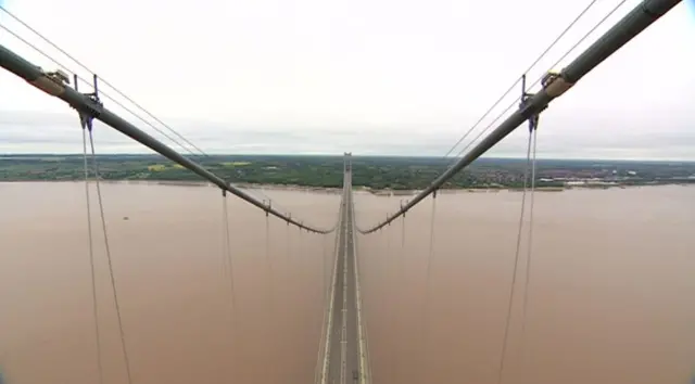 A view from the top of the Humber Bridge looking down to the road.