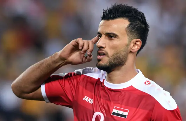 Omar Alsoma of Syria celebrates