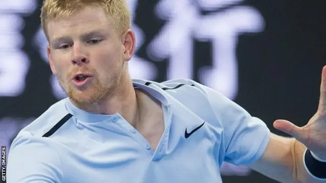 Kyle Edmund playing tennis.