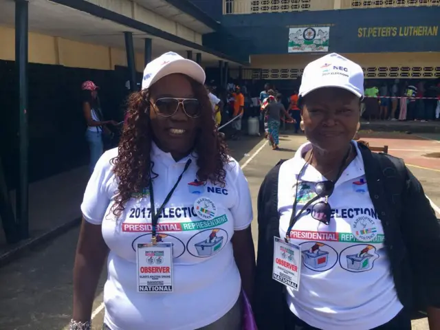 Kadiatu Kamara  (right) from MAWOPNET, the Manu River women’s Peace Network (a regional peace group) is visiting different polling stations around Monrovia observing the elections.