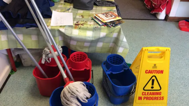 Mop and bucket at school