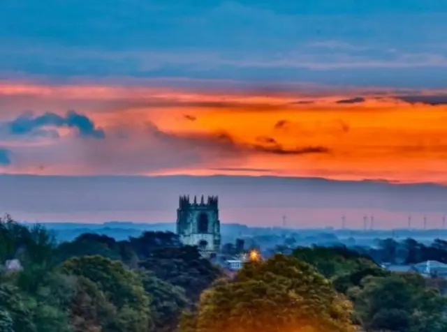 A view of the bell tower at St Mary's church from Beverley Westwood.