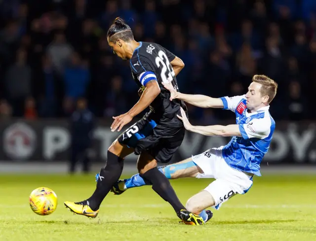 Bruno Alves is caught by a late tackle by Steven MacLean