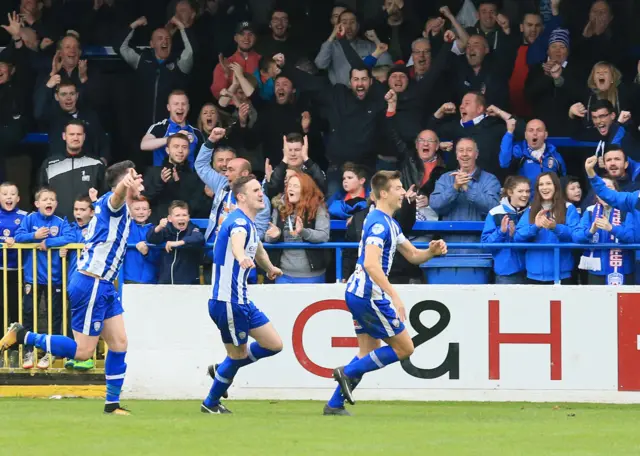 Brad Lyons runs away in celebration after scoring the opener for Coleraine in their win over Linfield