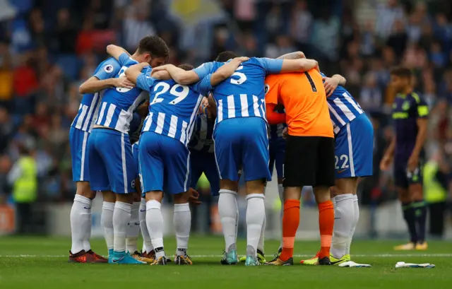 Brighton team huddle