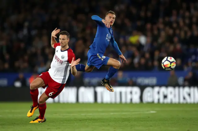 Jonny Evans fouls Jamie Vardy