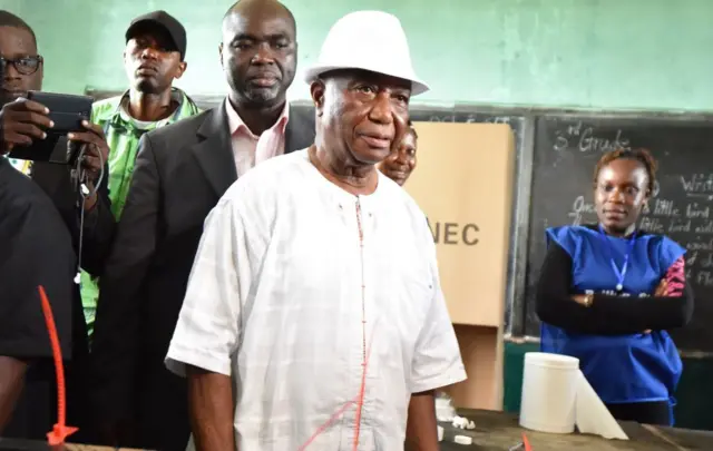 Liberian Vice President and presidential candidate Joseph Boakai prepares to cast his vote at a polling station in Monrovia during presidential and legislatives elections on October 10, 2017