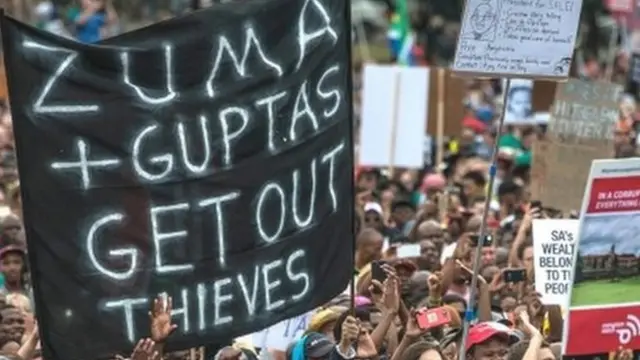 Tens of thousands of South Africans from various political and civil society groups march to the Union Buildings to protest against South African president and demand his resignation on April 7, 2017 in Pretoria.