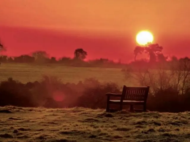 Chair and red sun in Beverley