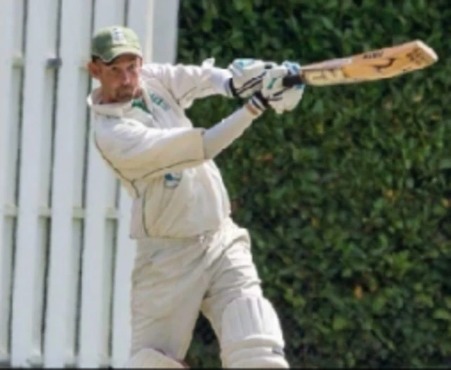 Rob playing cricket