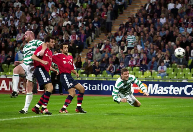 Alan Thompson heads Celtic in front against Bayern Munich