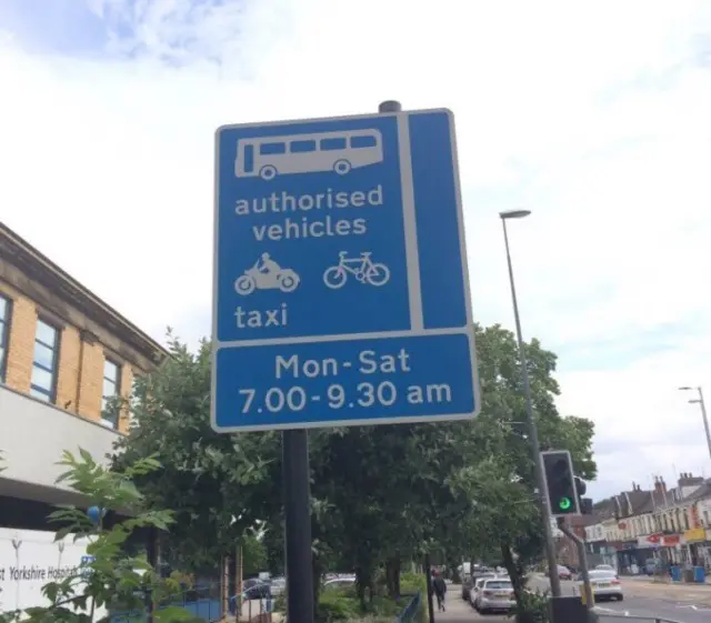 Sign showing bus lane