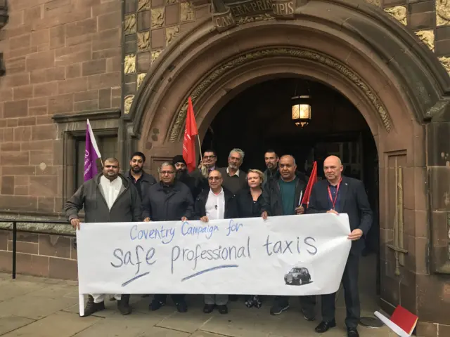 Black cab drivers, councillors and police launching the Coventry safe taxis campaign.