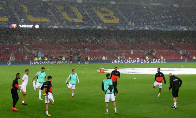 Olympiacos warm up at the Nou Camp