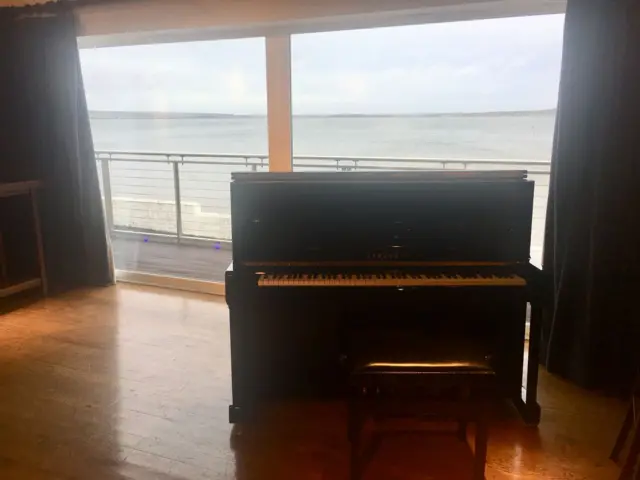 The piano set up ready in Islay for Scottish Opera