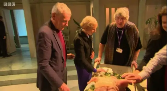 Members of the audience on a touch tour of the Die Fledermaus set
