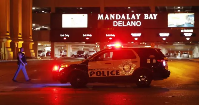 police car outside of Mandalay bay sign