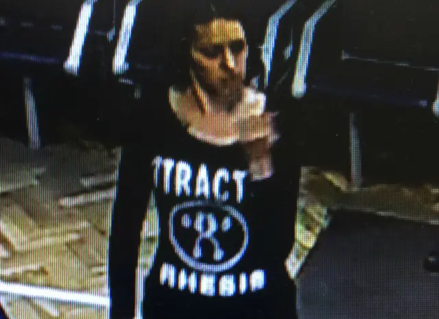 CCTV image of woman