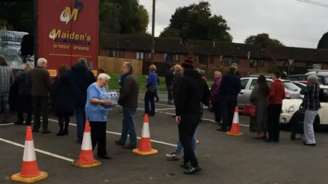 Residents in Tenbury Wells collecting water