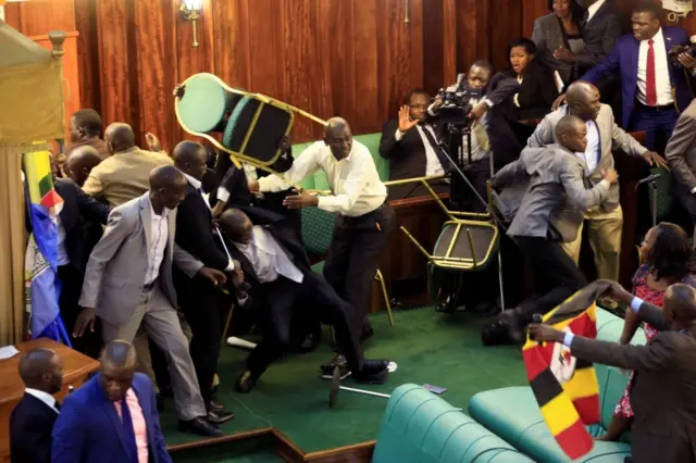 Uganda MPs fight during parliament debate