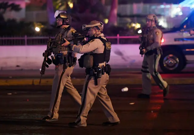 Police attend the scene of the shooting in Las Vegas