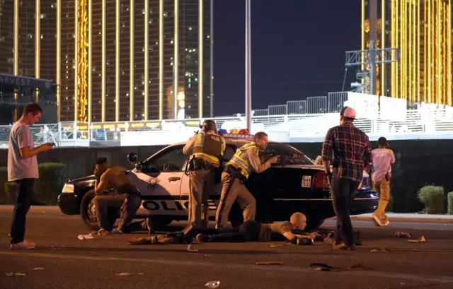 Police attend the scene of the Las Vegas shooting