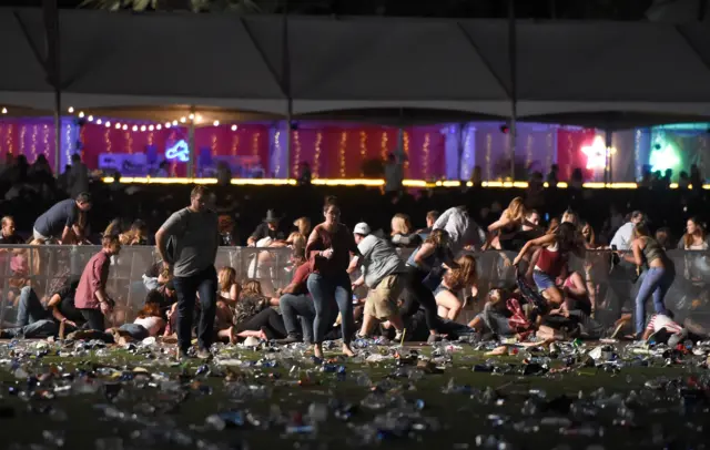 People flee the scene of the shooting