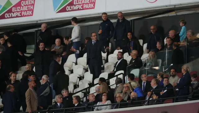 Fans argue inside the London Stadium