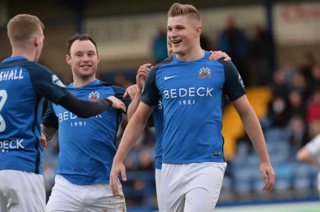 Glenavon striker Andrew Mitchell celebrates scoring against Ballymena at Mourneview Park