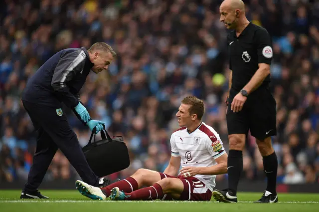 Chris Wood receives medical treatmen