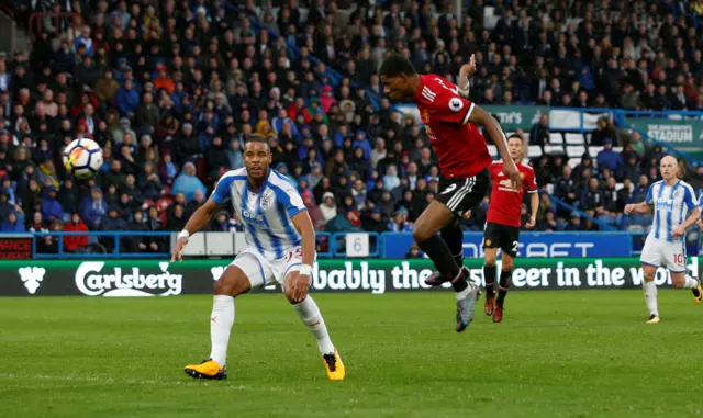 Marcus Rashford scores