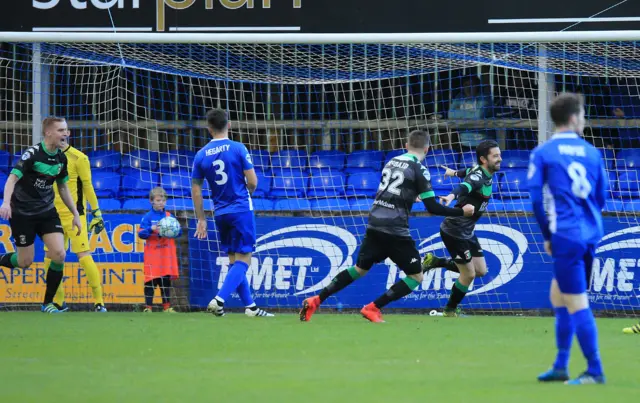 Glens striker Curtis Allen wheels away in delight after his early opener against Dungannon Swifts