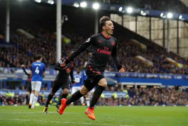 Mesut Ozil celebrates