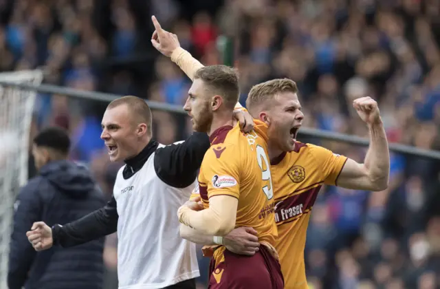 Louis Moult (centre) celebrates Motherwell's win