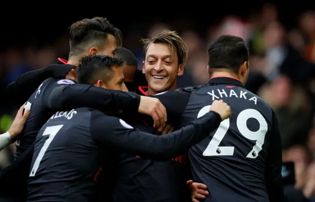 Mesut Ozil celebrates