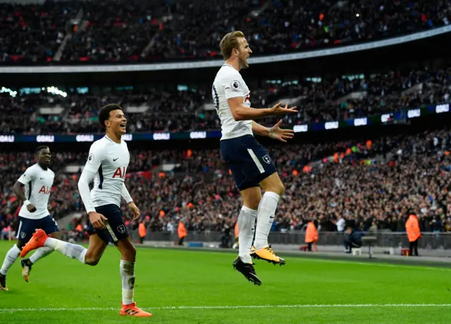 Harry Kane celebrates one of his goals against Liverpool