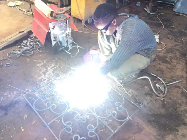 Man welding in Kenya