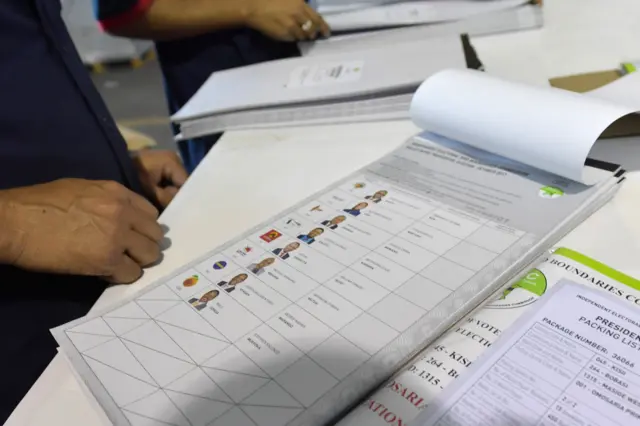 Employees check ballots for Kenya's upcoming presidential elections before their shipment from Dubai -  21 October 21 2017